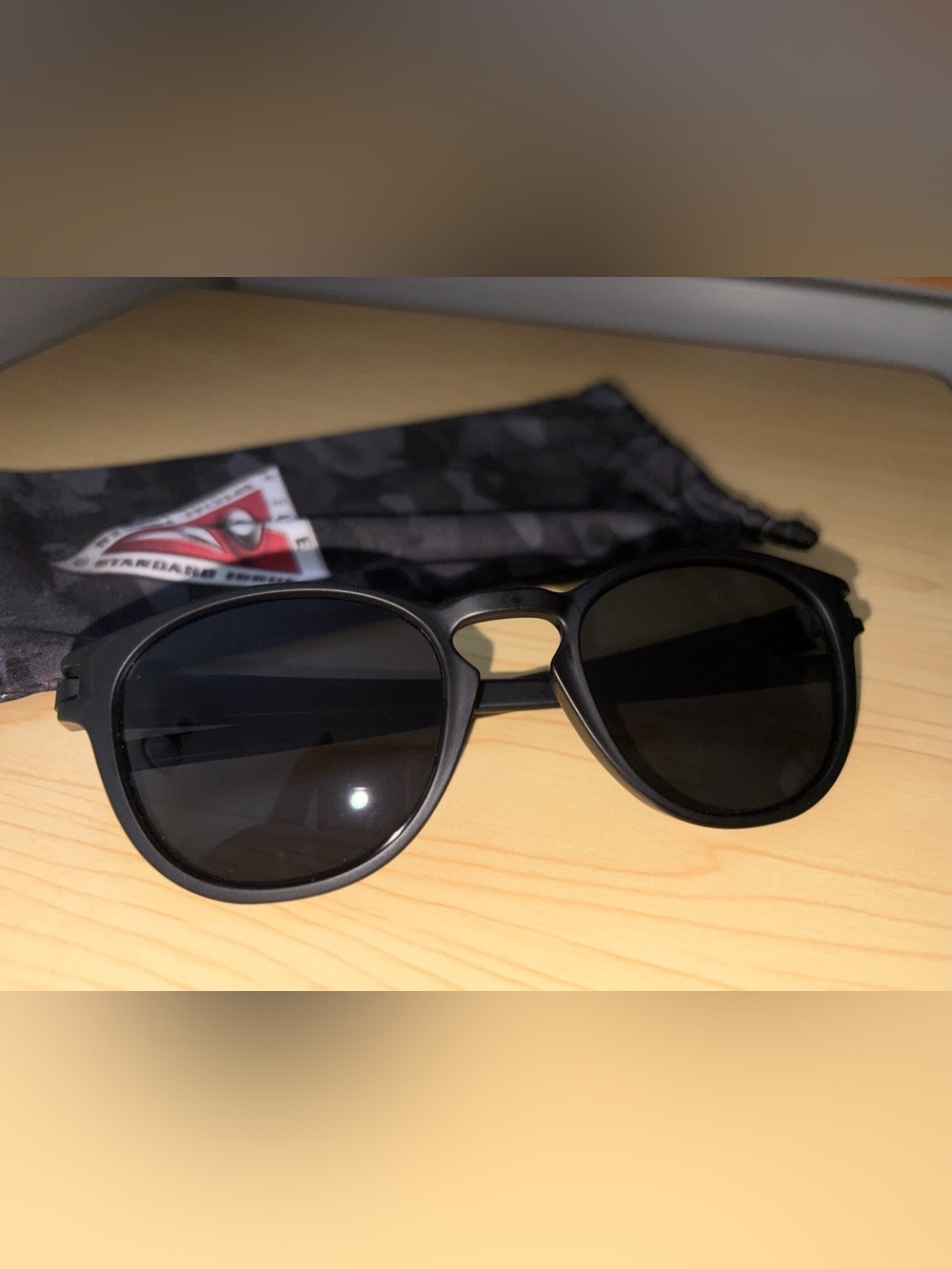 Matte black Oakley sunglasses